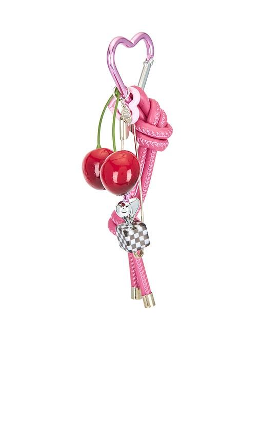 8 other reasons bag charms in pink.