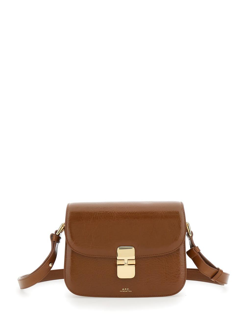 a. p.c. grance brown small crossbody bag wirh embossed logo lettering on the front and adjustable shoulder strap in hammered leather woman
