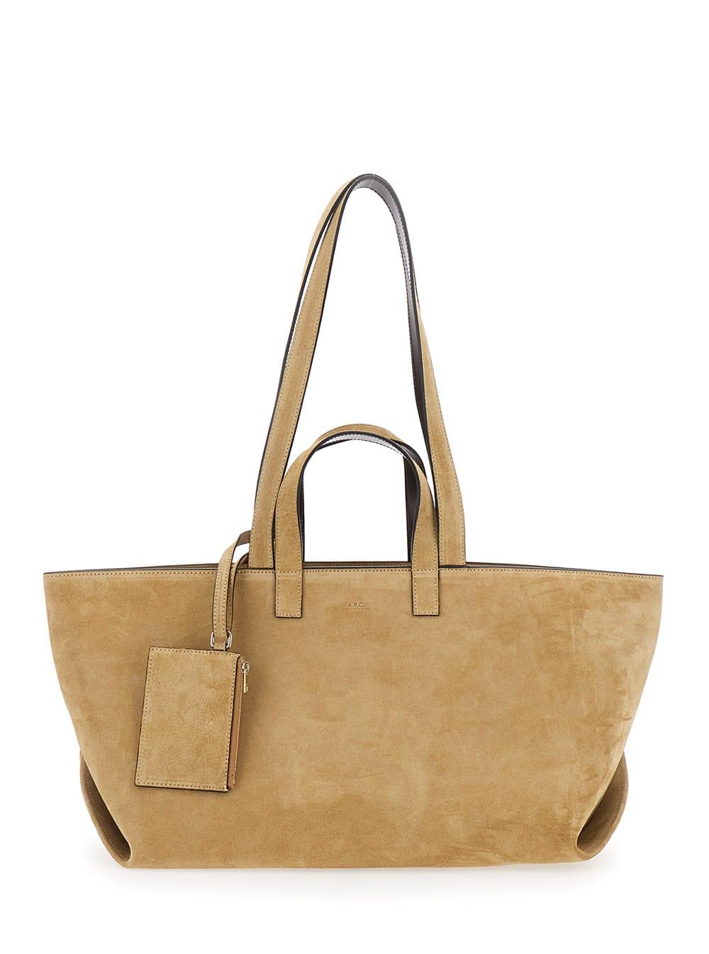 a. p.c. le drummer beige shopper with four handles and logo lettering on the front in suede women