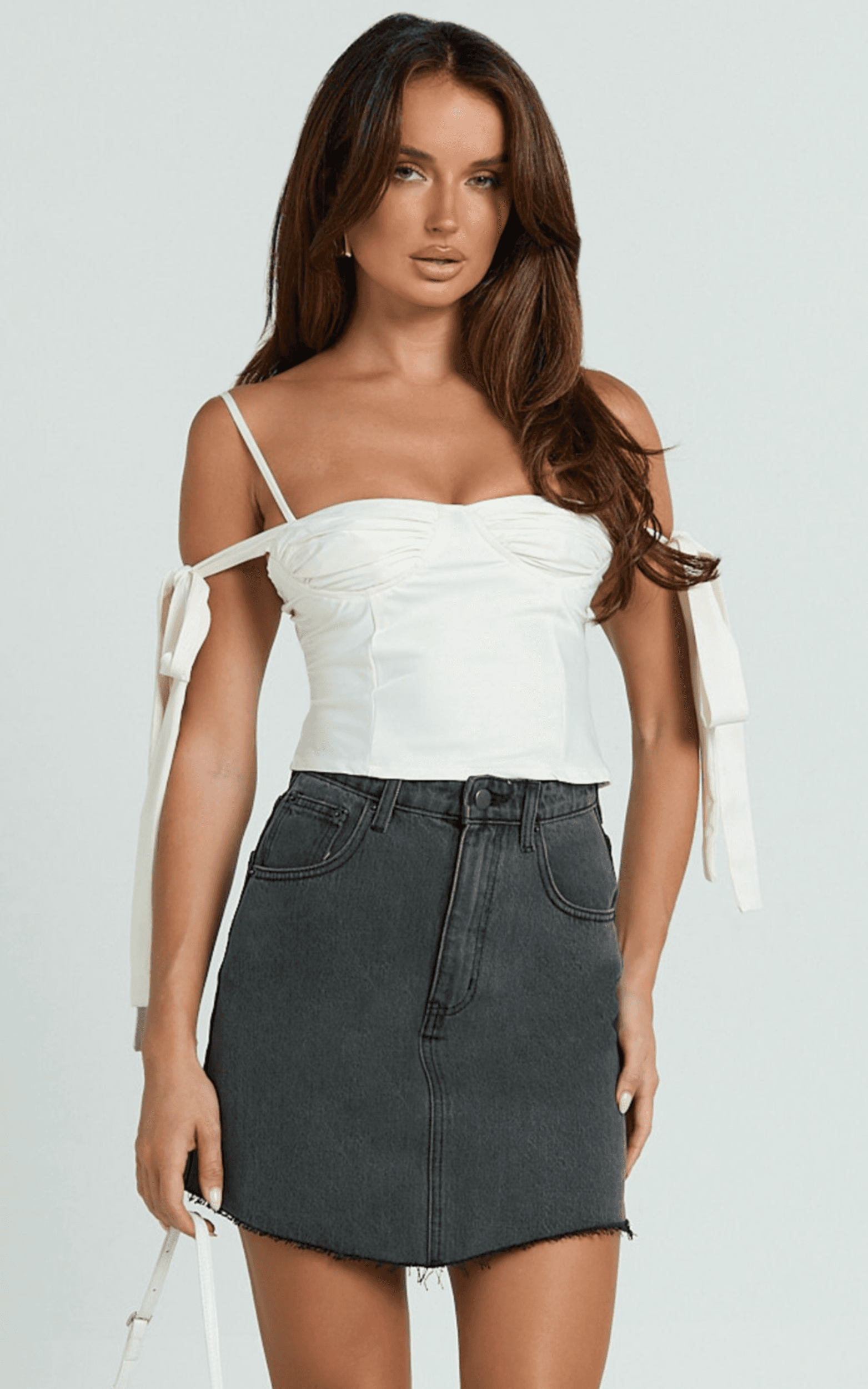 adan mini skirt - recycled cotton frayed hem denim skirt in black