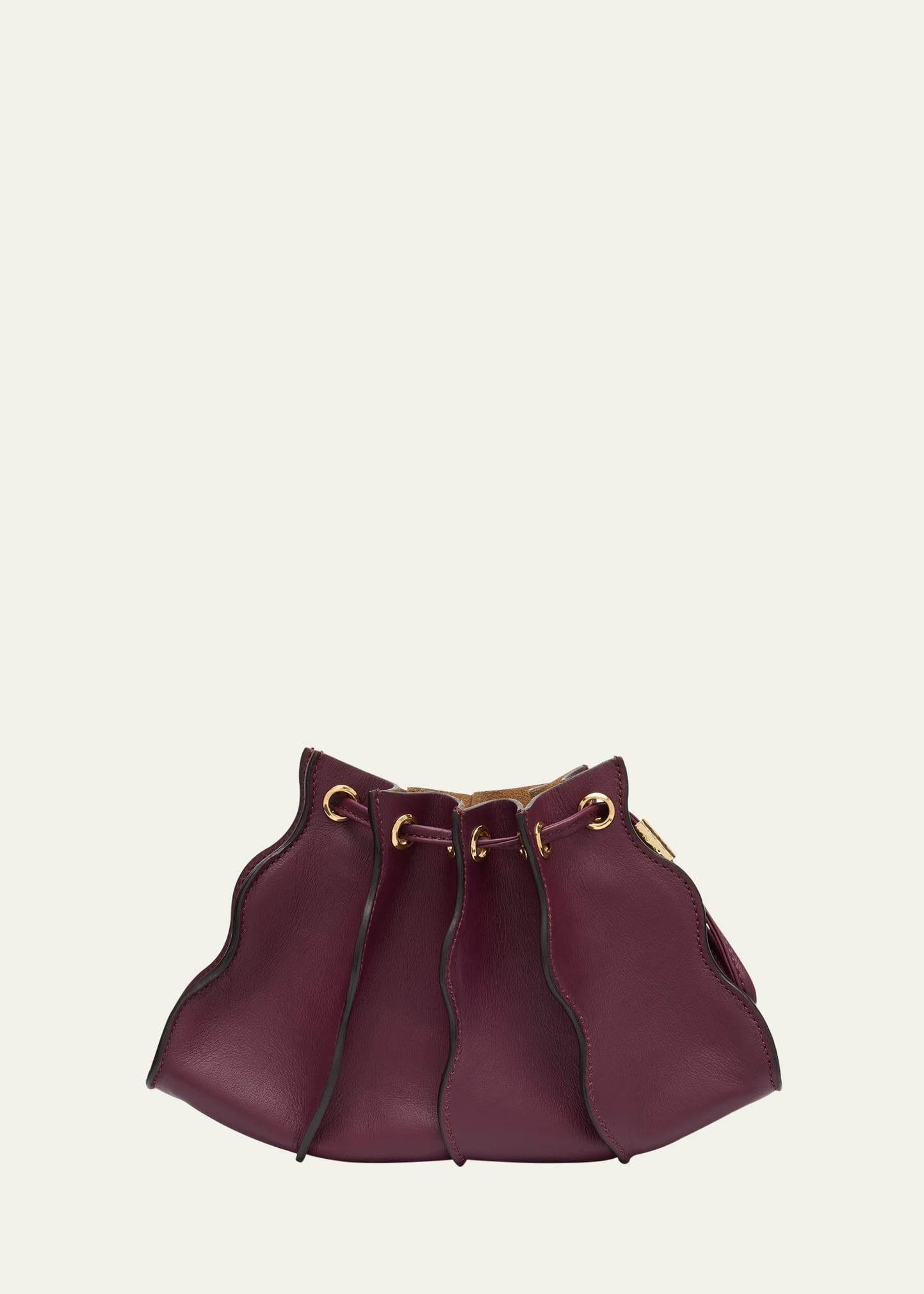 adria mini pleated wave leather crossbody bag