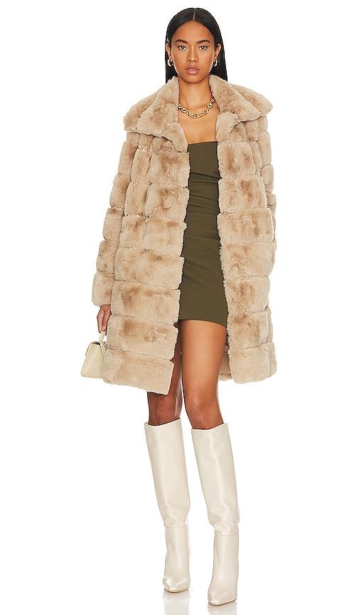 adrienne landau x revolve faux fur long coat in beige.