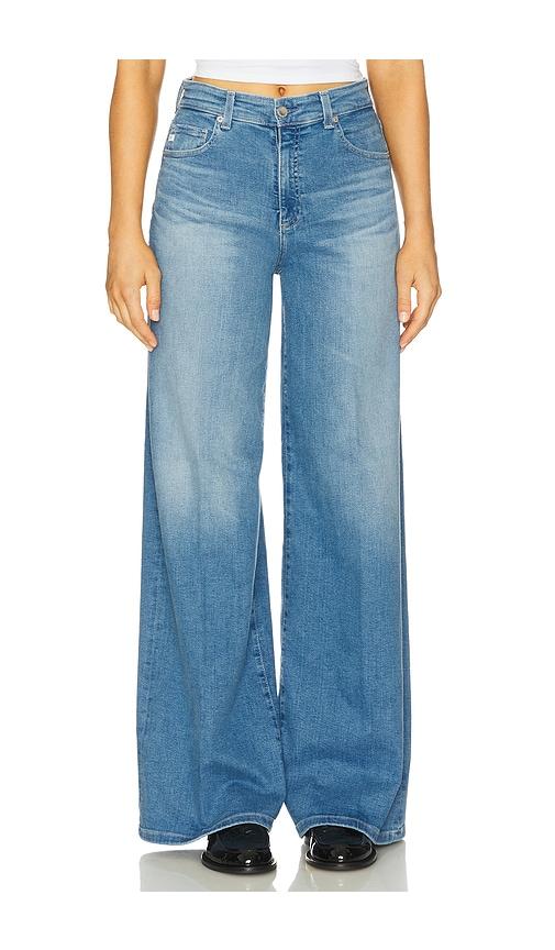 ag jeans deven flare jeans in blue.