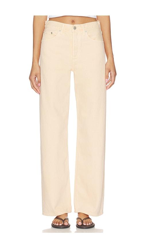 agolde arc jeans in peach.