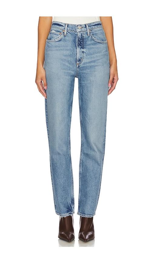 agolde high rise stovepipe jeans in blue.
