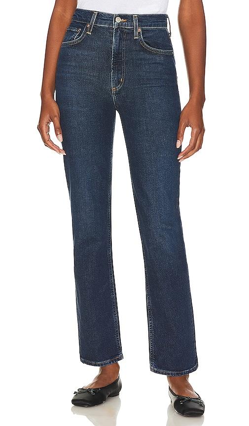 agolde high rise stovepipe jeans in denim-dark.