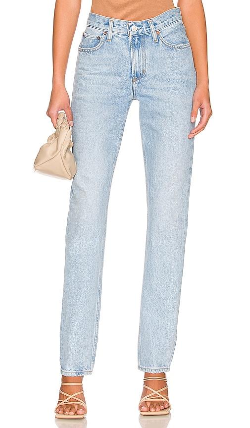 agolde lyle low rise slim jeans in denim-light.