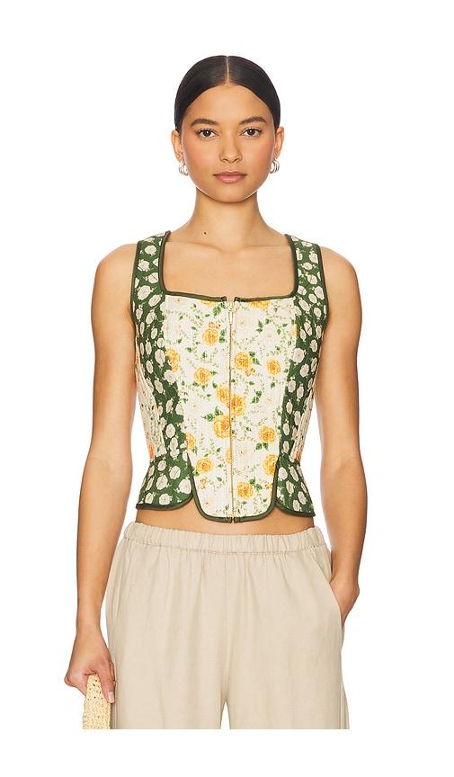 agua bendita sinclair ete top in green.