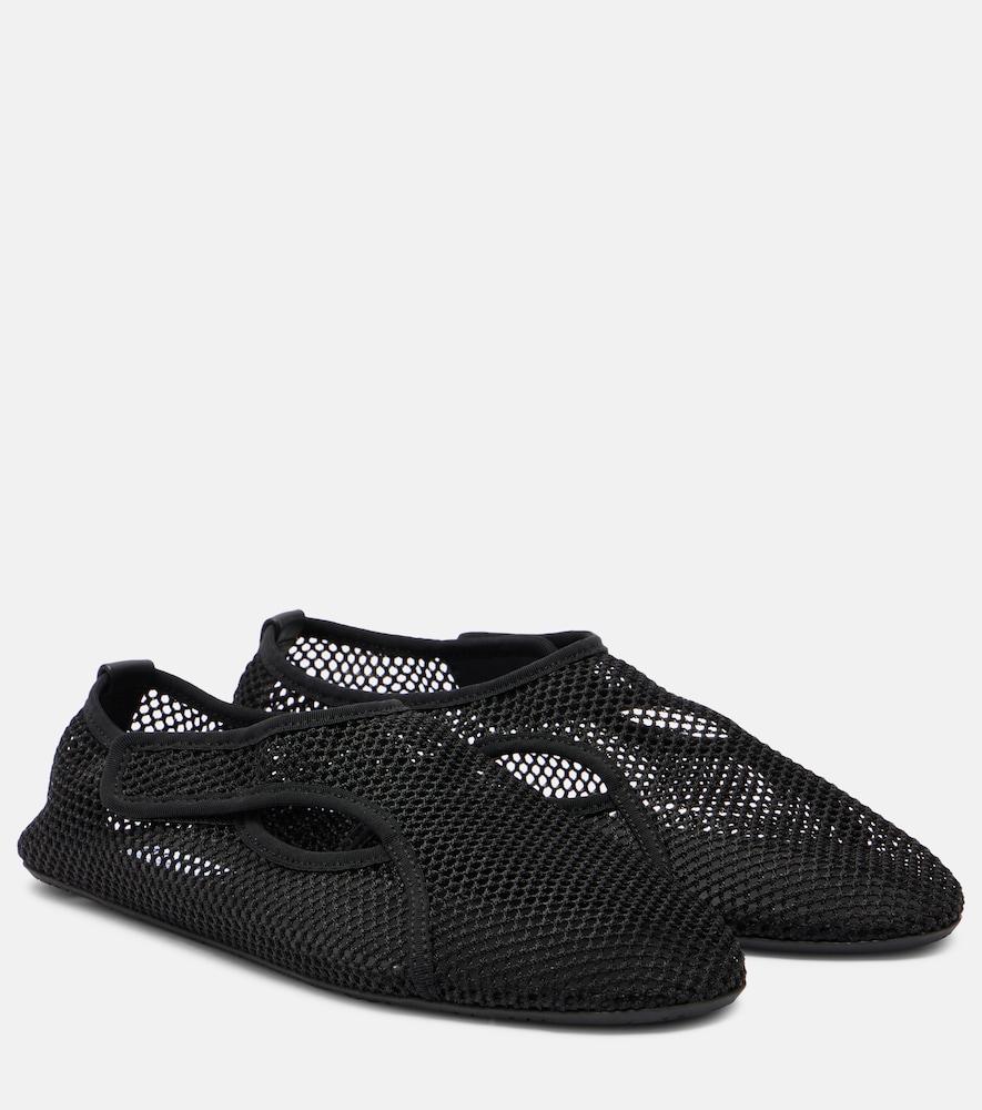 alaïa fishnet slip