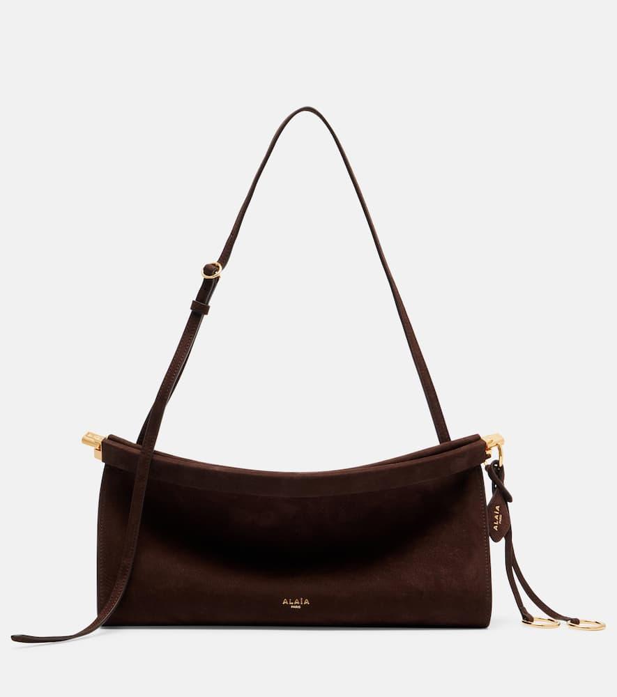 alaïa le click east west medium suede shoulder bag