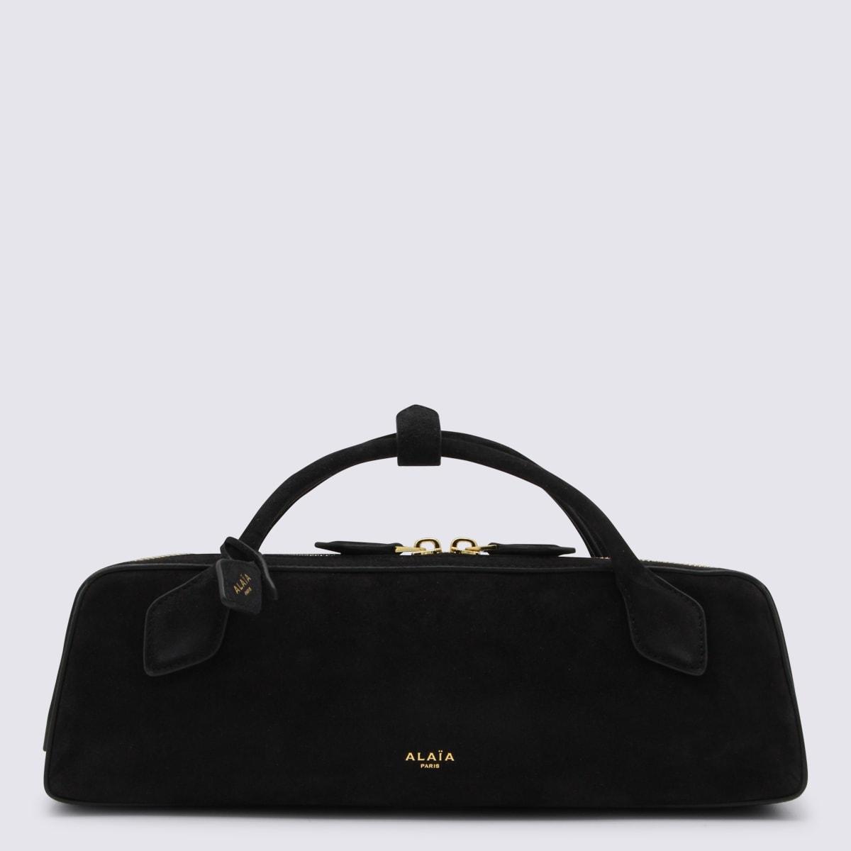 alaia black leather le teckel clutch