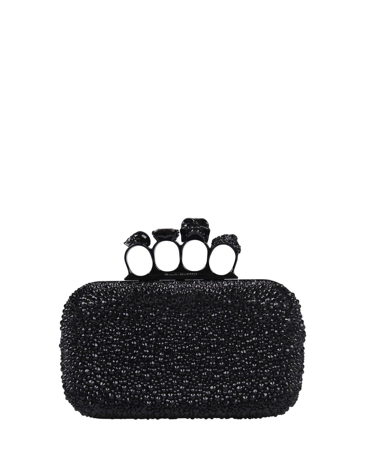 alexander mcqueen black skull four ring clutch bag with chain