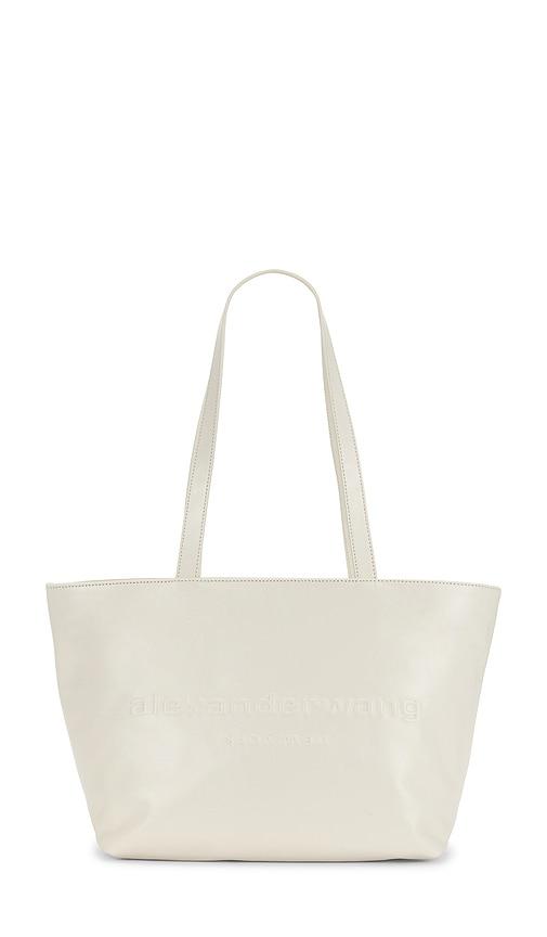 alexander wang punch medium tote bag in cream.