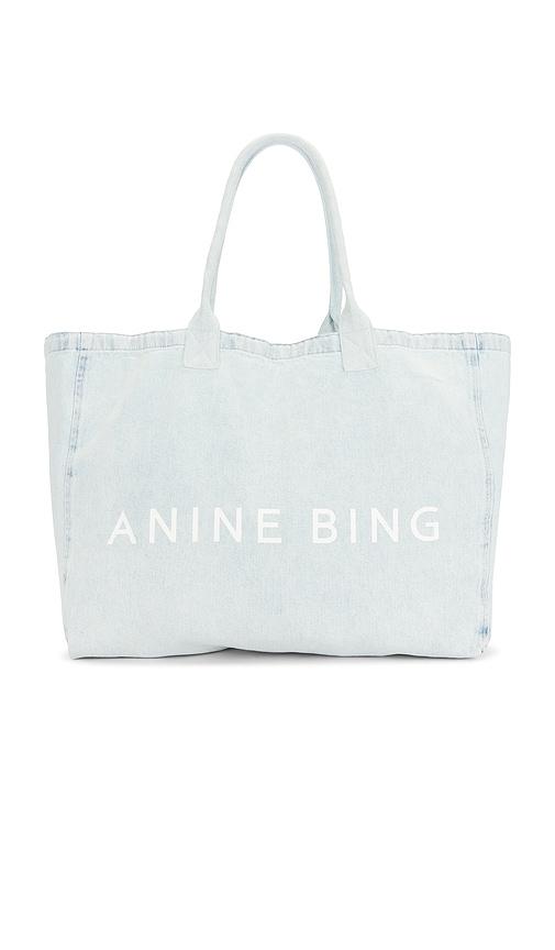anine bing leo denim tote bag in blue.