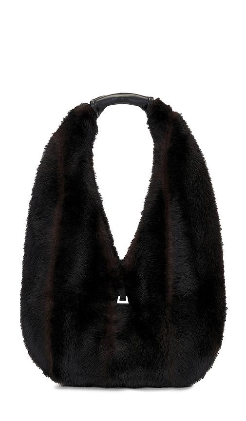 apparis colette shaved mink bag in black.