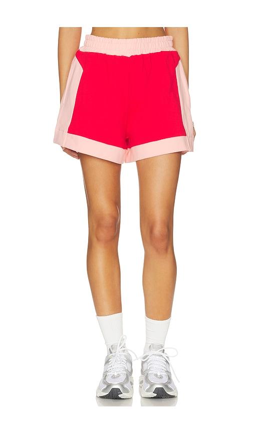 araminta james retro track short in red,pink.