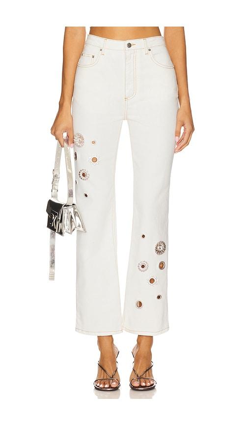 area crystal grommet straight leg jean in cream.