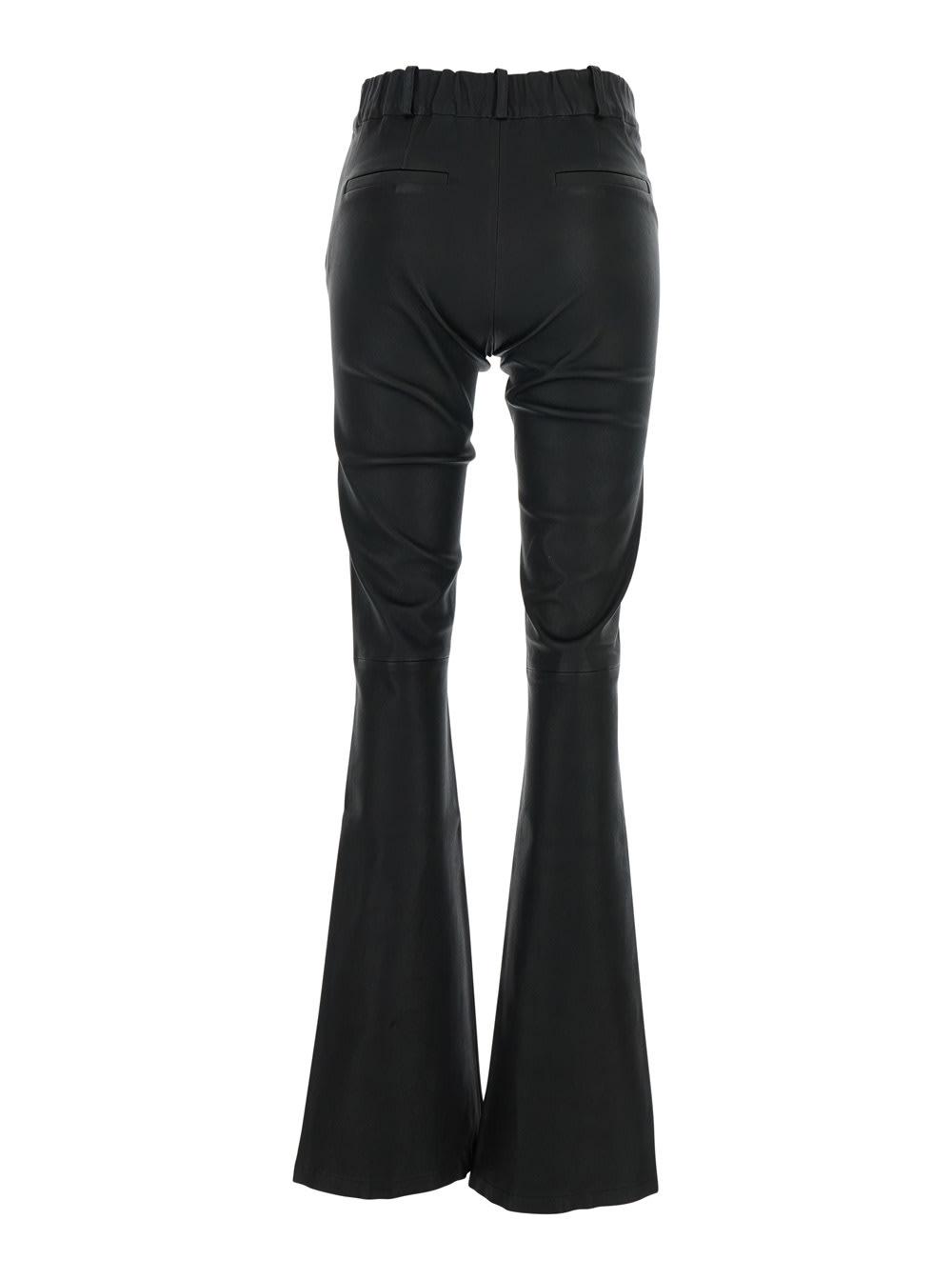 arma black trousers with belt loops and flared legs in leather woman