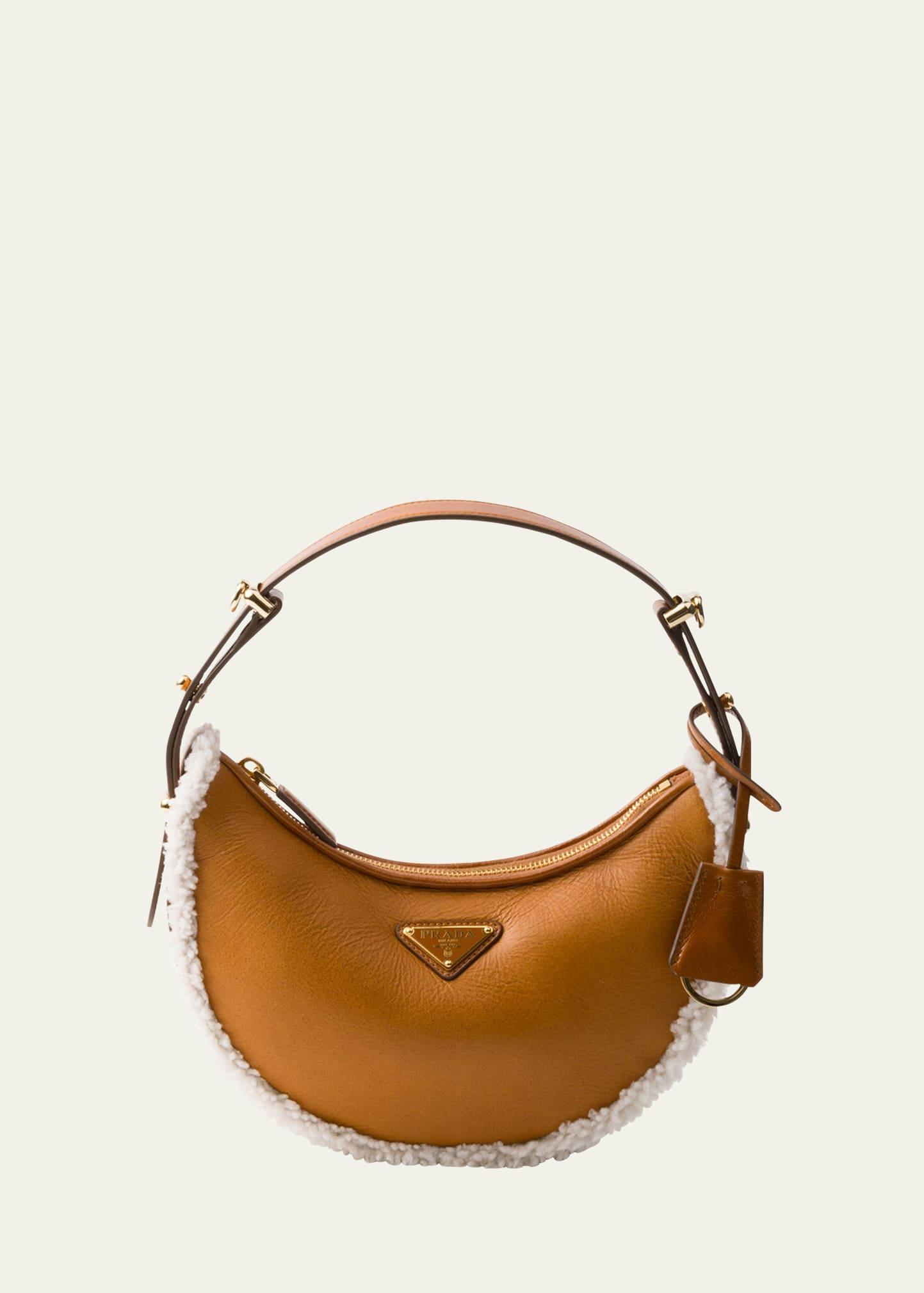 arque sheep shearling shoulder bag