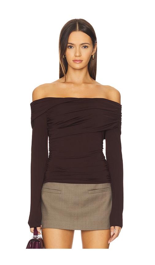 astr the label datia top in brown.