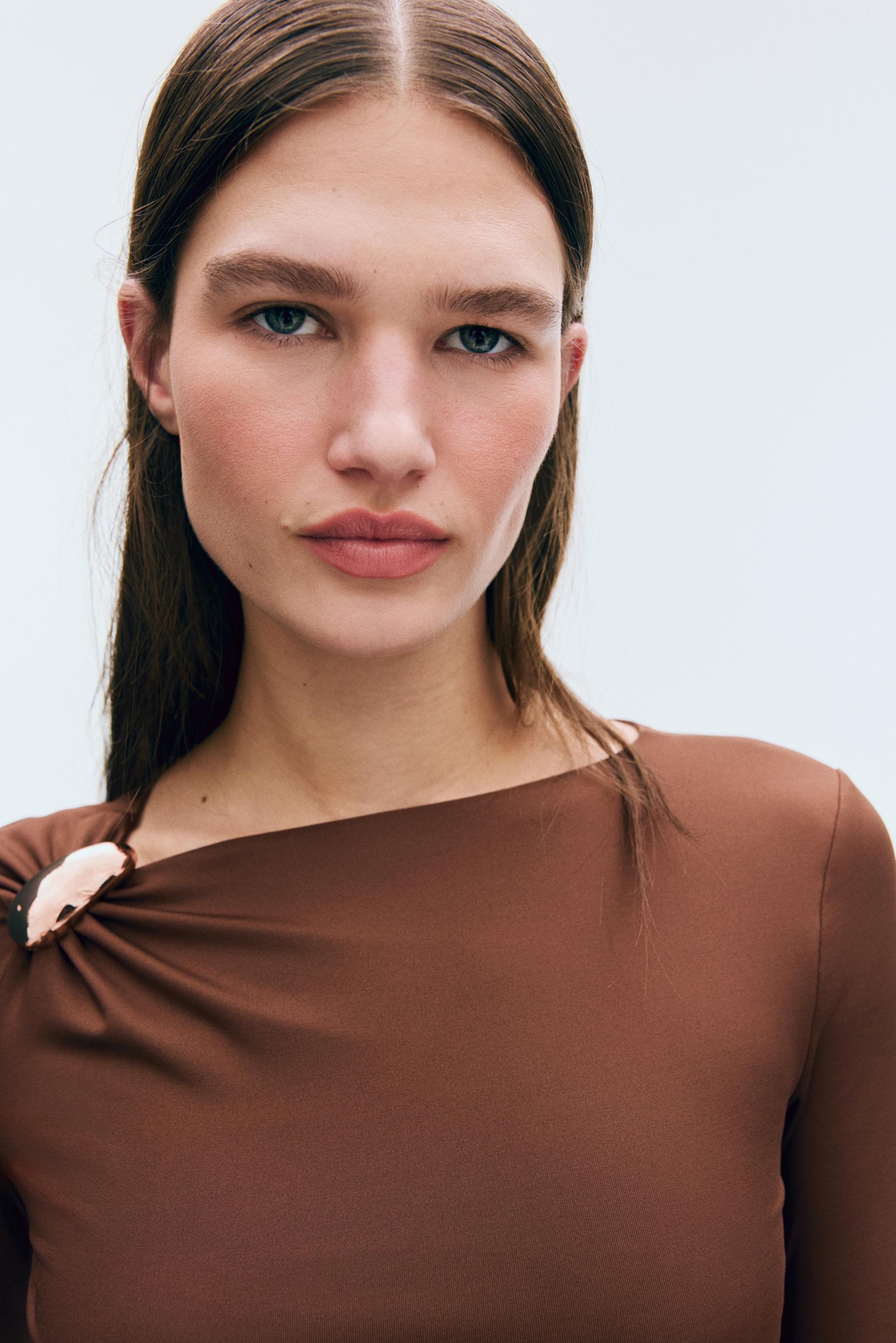asymmetric jersey top