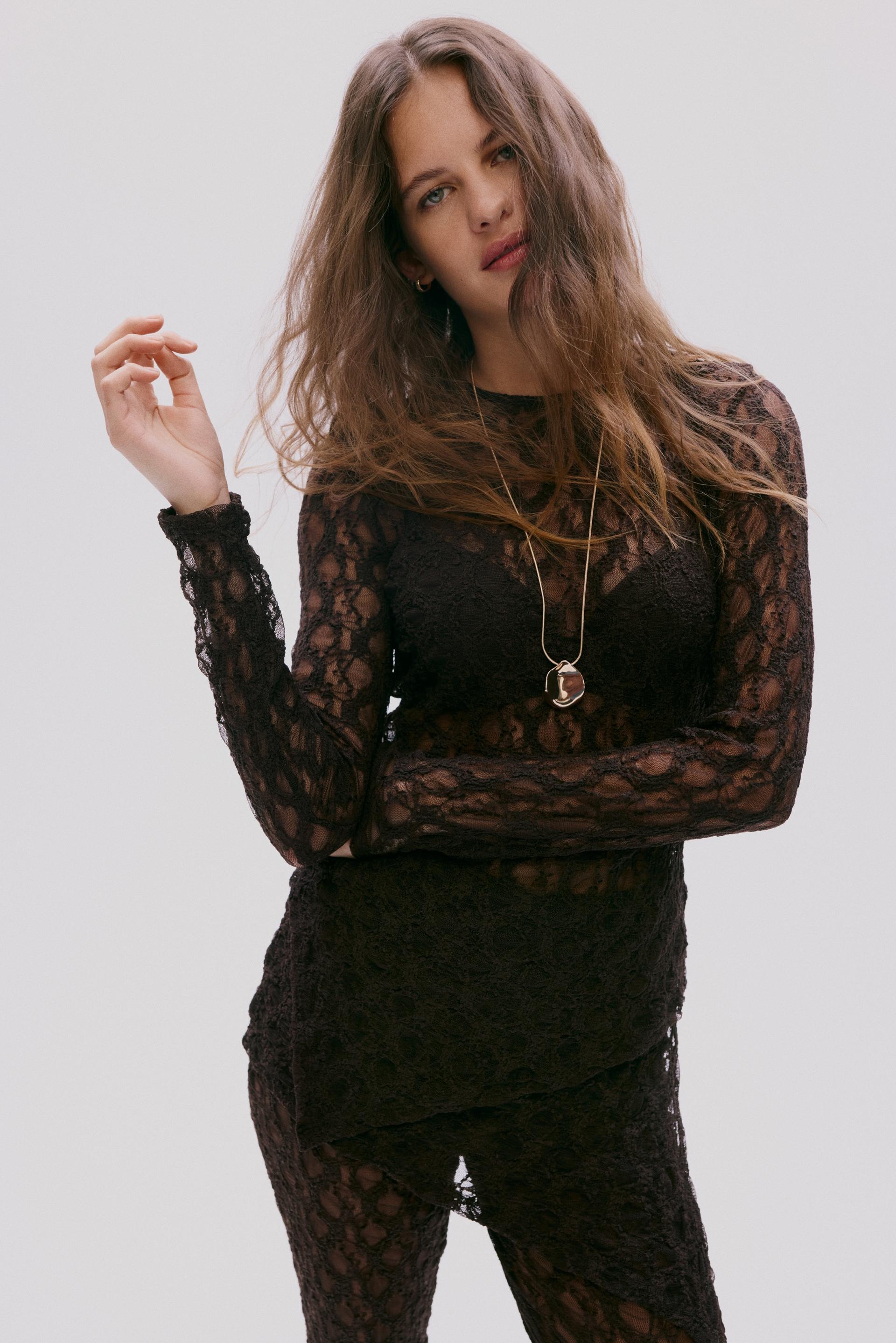 asymmetric lace-look top
