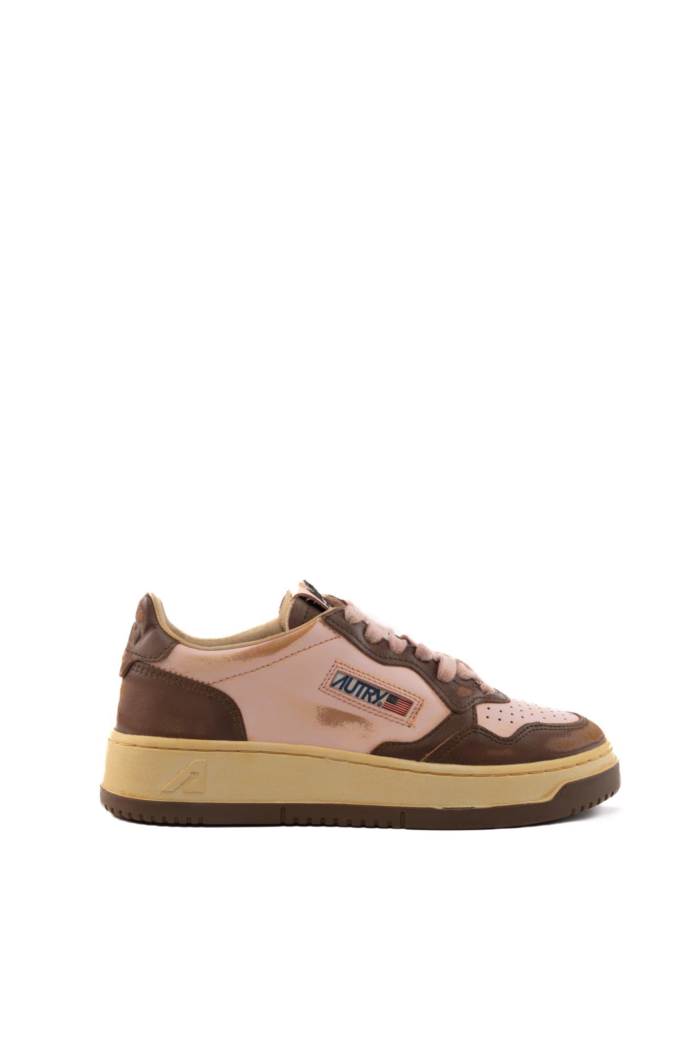 autry medalist low super vintage sneakers in brown/pink leather