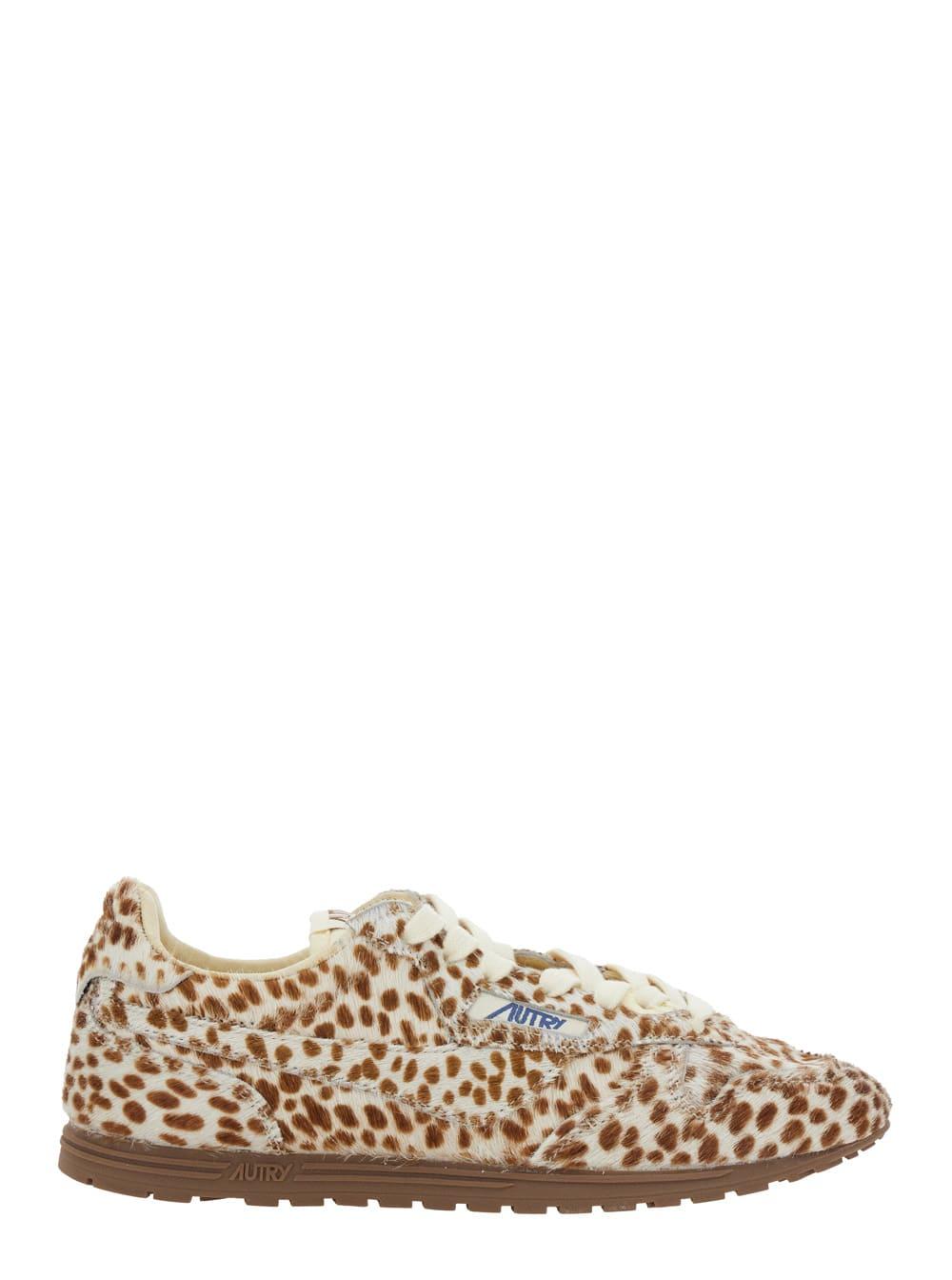 autry windspin low multicolor sneaker with logo on the side and animalier motif in suede woman