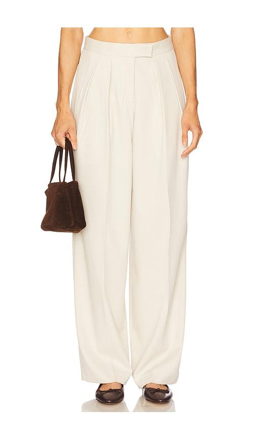 aya muse high waisted pleated trousers in ivory.
