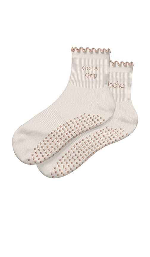 bala the frilly sock in sand.