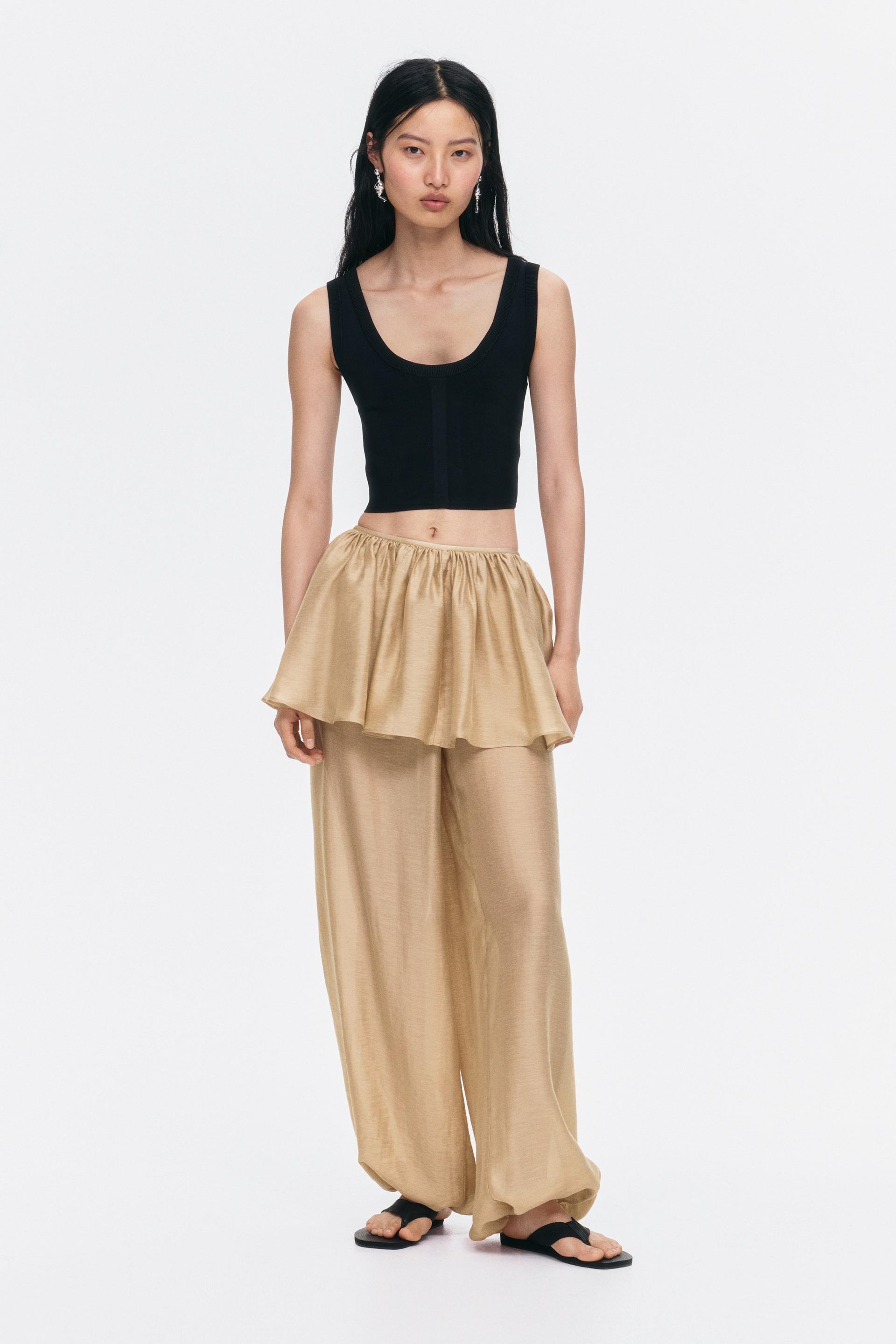 balloon-leg pants with layered skirt