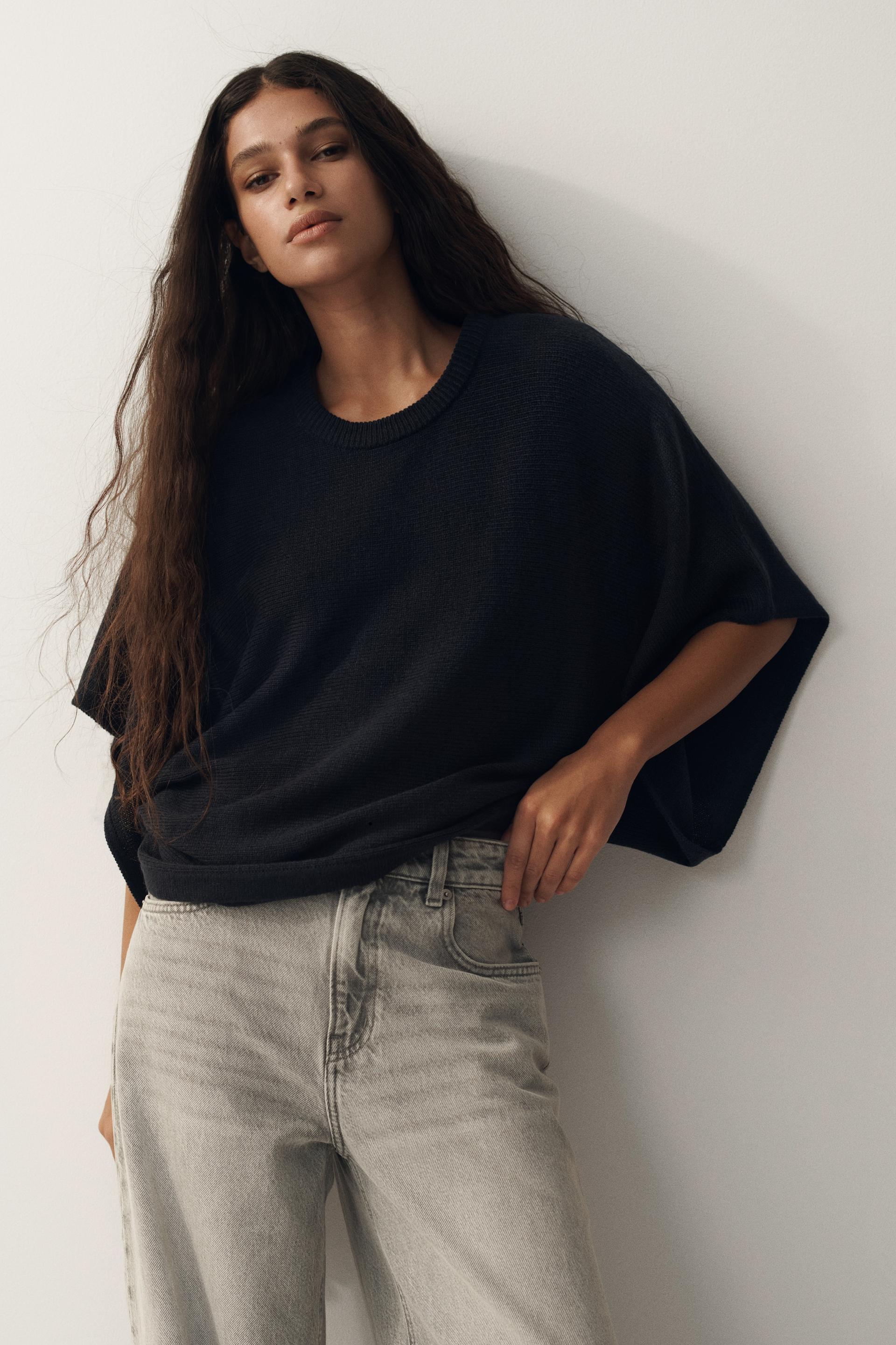batwing-sleeved knit top