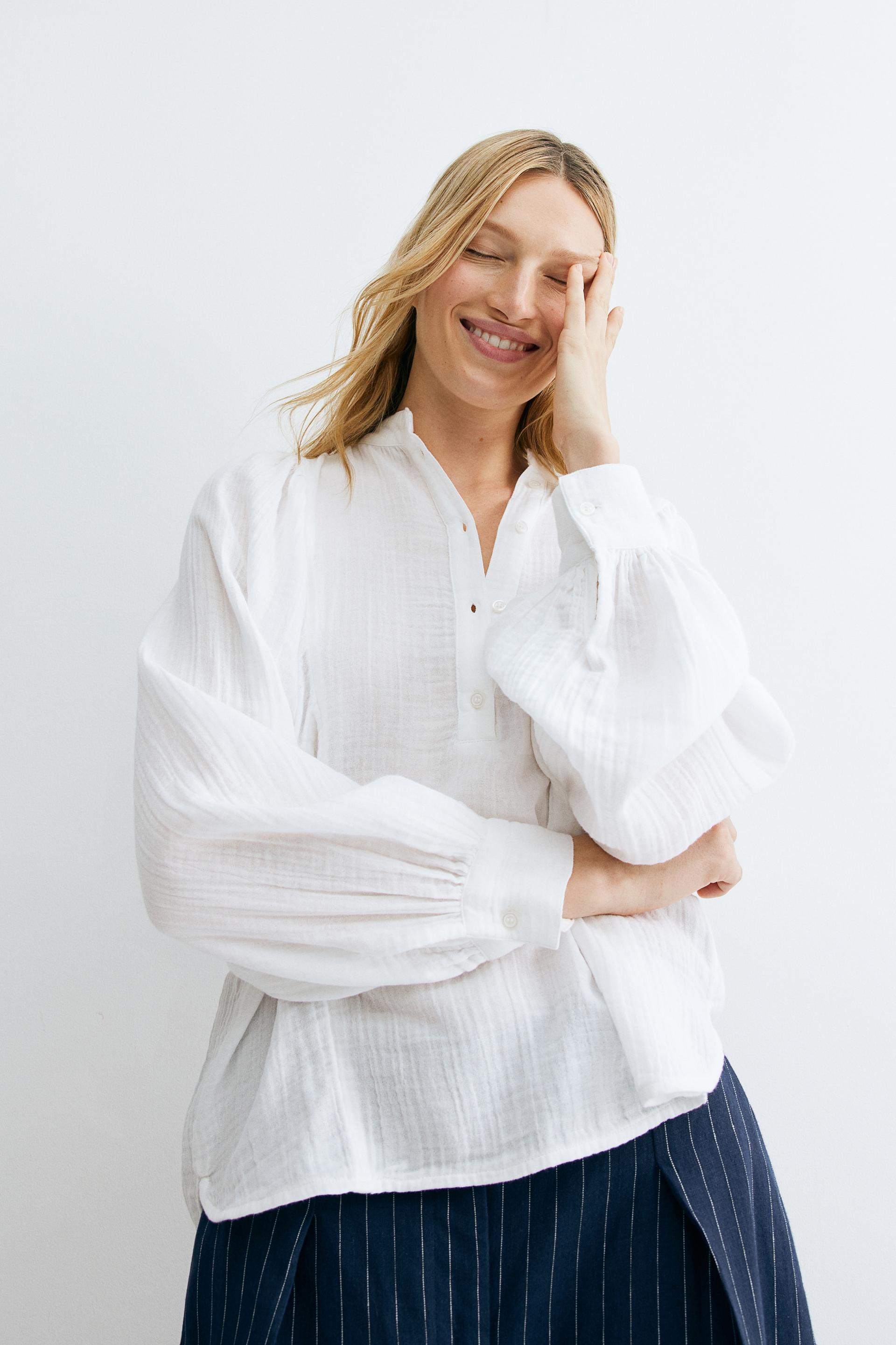 batwing-sleeved muslin blouse