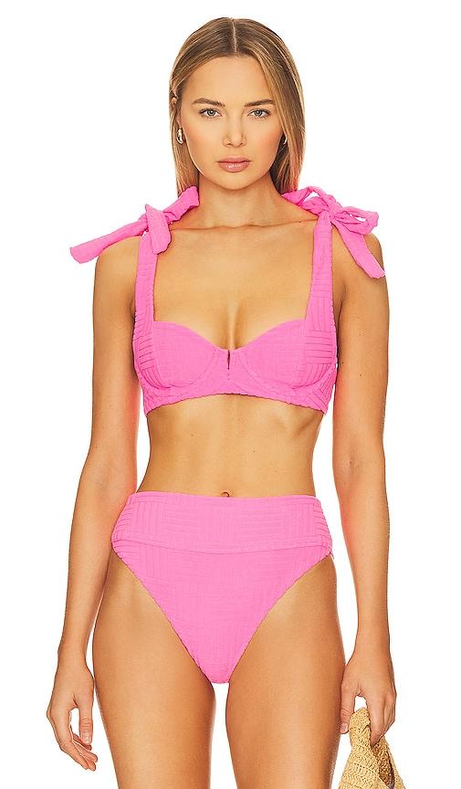 beach riot blair bikini top in pink.