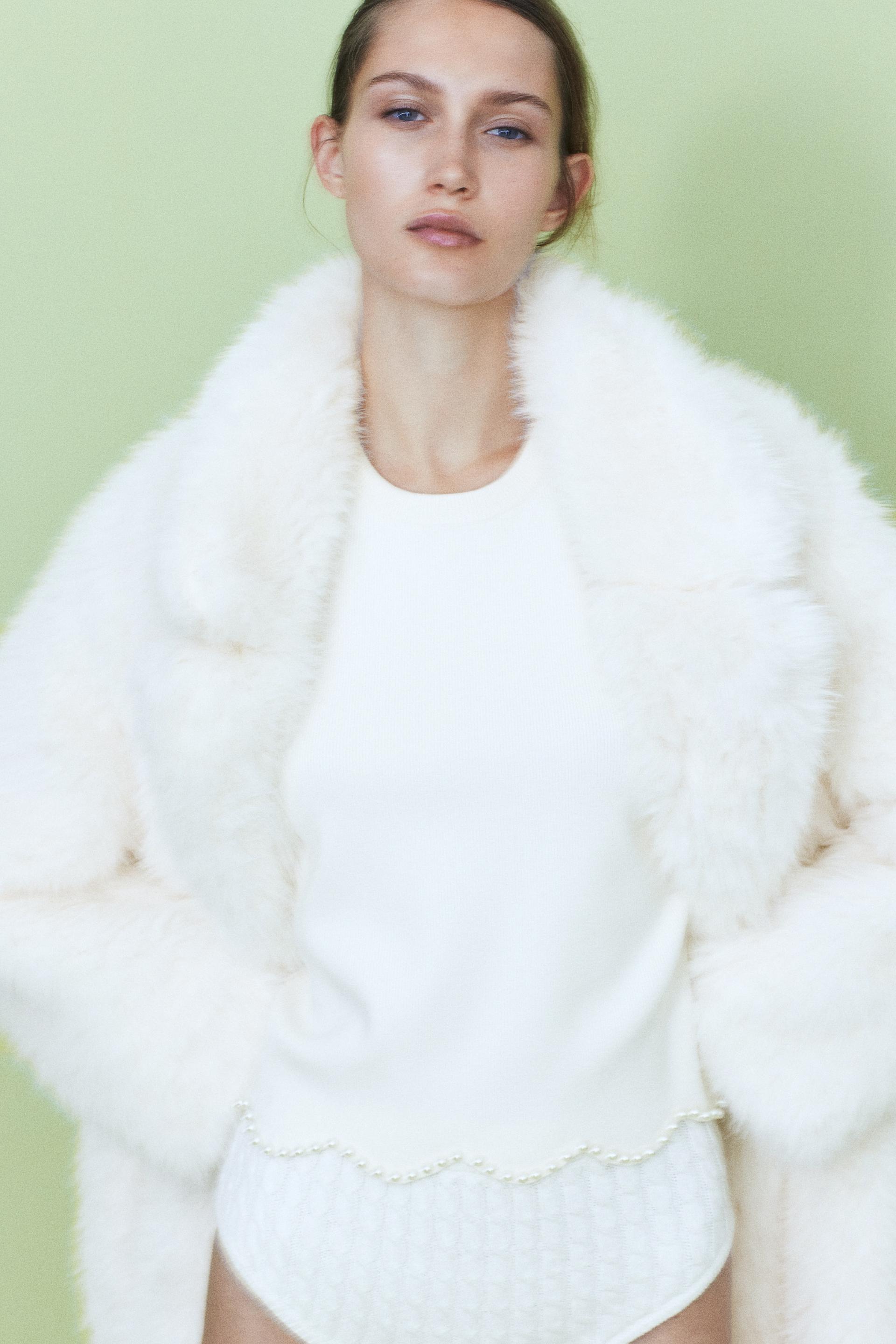 bead-embellished knit top