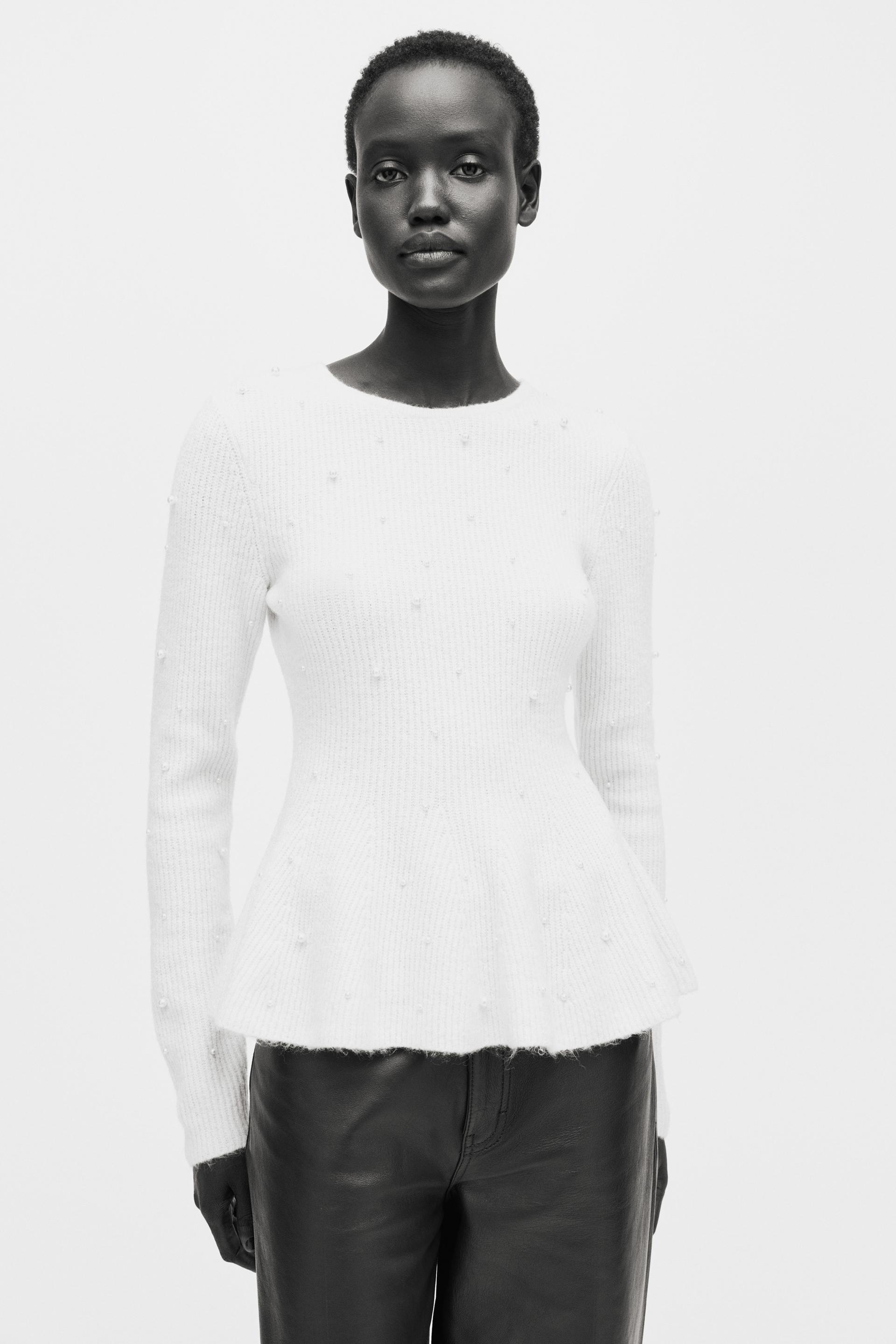 bead-embellished peplum top