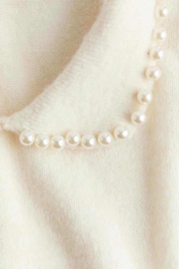 beaded-collar knit top