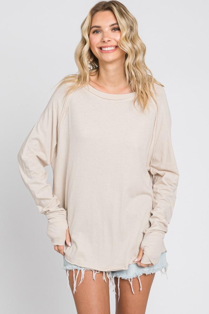 beige exposed seam long sleeve top