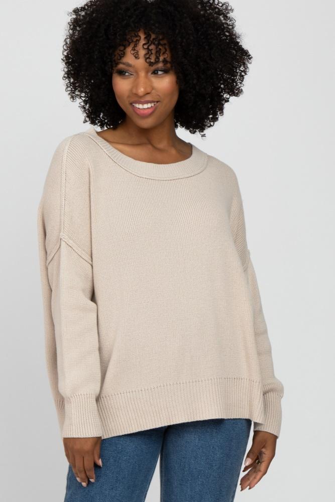 beige exposed seam side slit sweater
