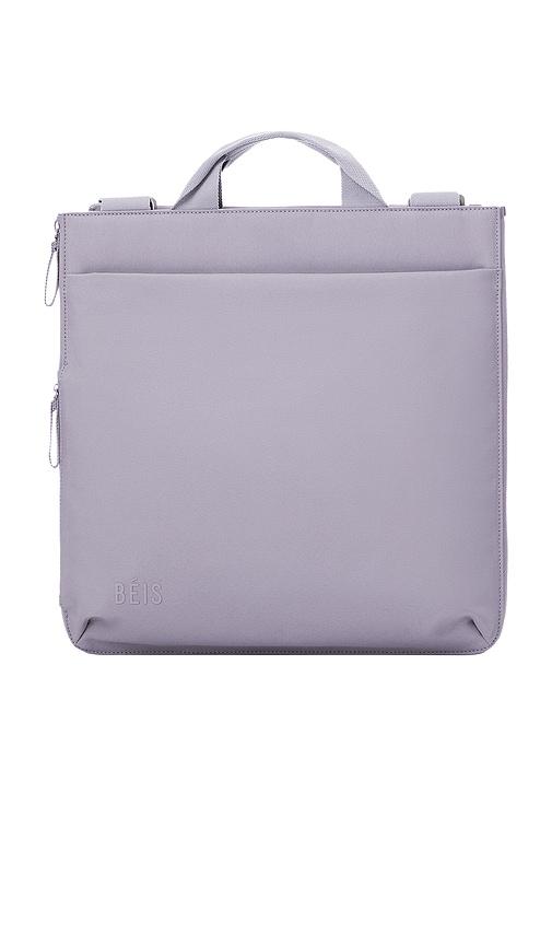 beis the convertible luggage vest in purple.