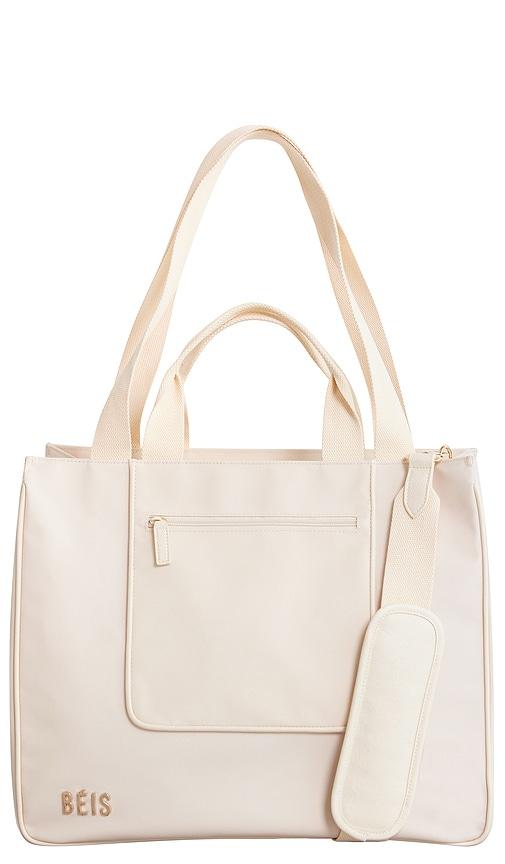 beis the east / west tote in beige.