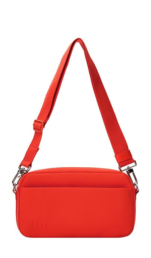 beis the travel crossbody bag in red.