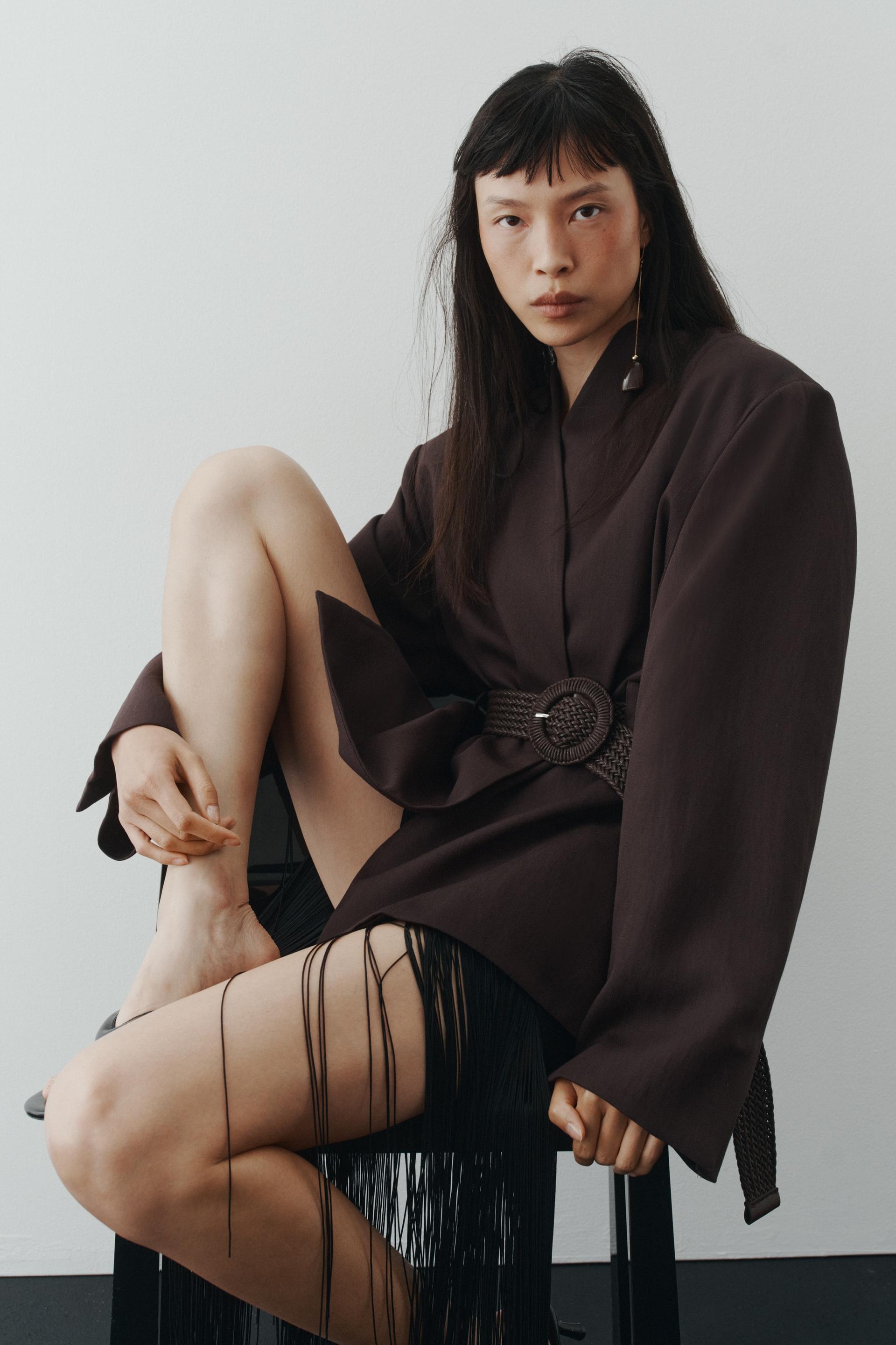 belted lapelless jacket