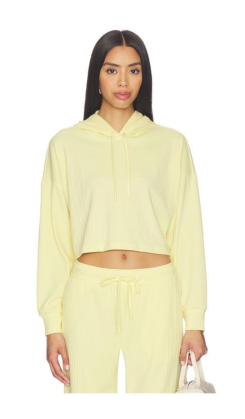 beyond yoga breathe easy ribbed cropped hoodie in yellow.