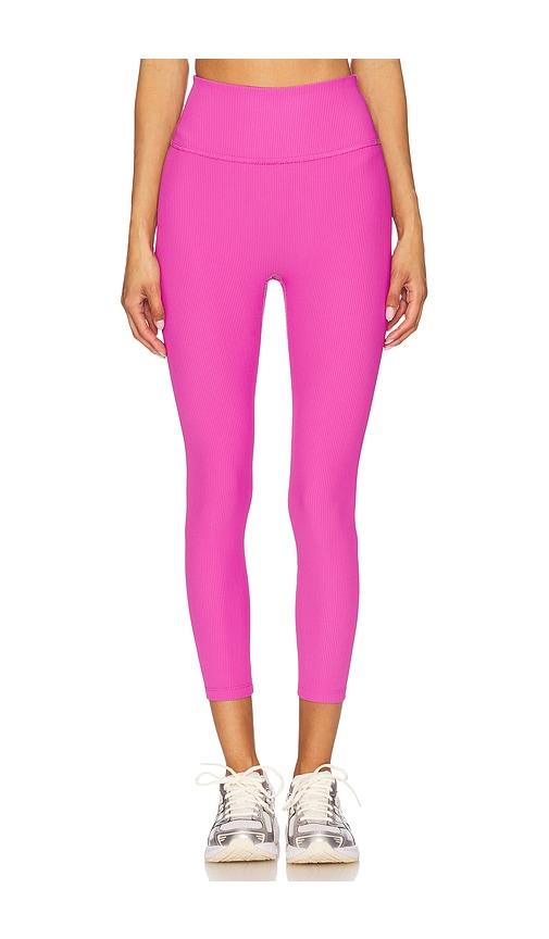 beyond yoga impulse ribbed high waisted midi legging in fuchsia.