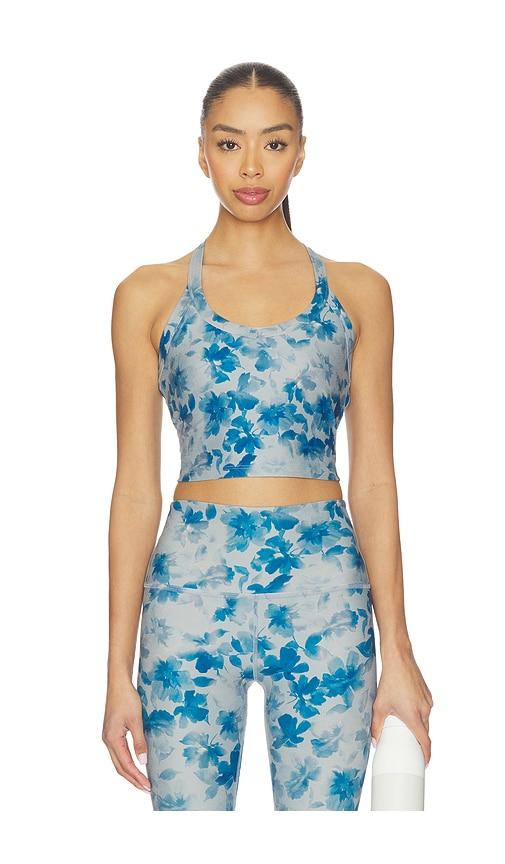 beyond yoga softmark on the up cropped tank top in blue.