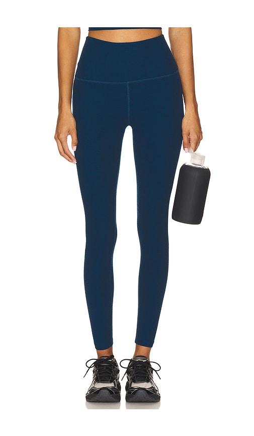 beyond yoga spacedye caught in the midi high waisted legging in blue.