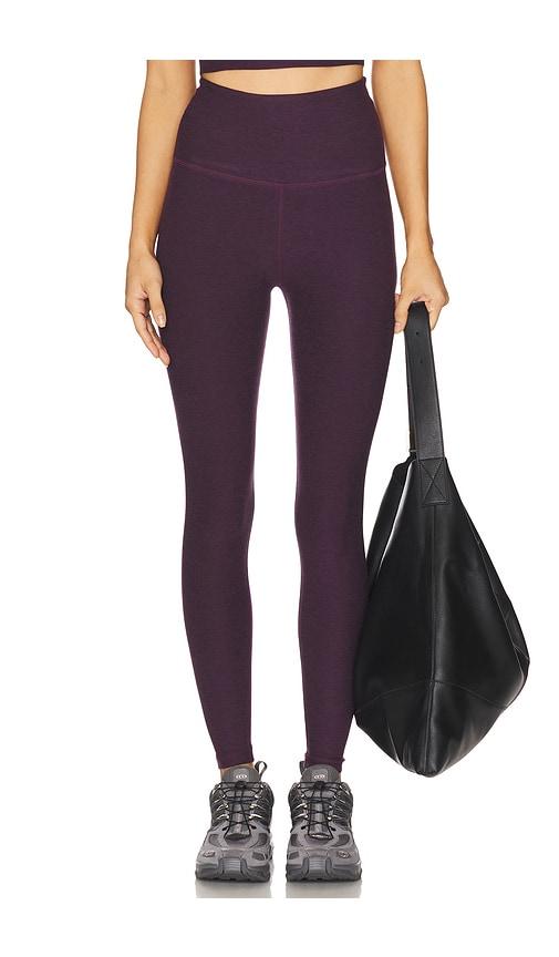 beyond yoga spacedye caught in the midi high waisted legging in purple.