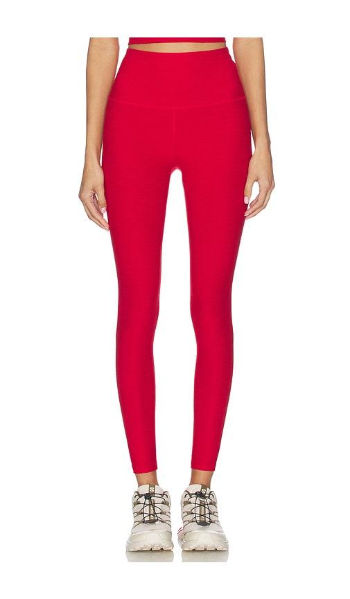beyond yoga spacedye caught in the midi high waisted legging in red.