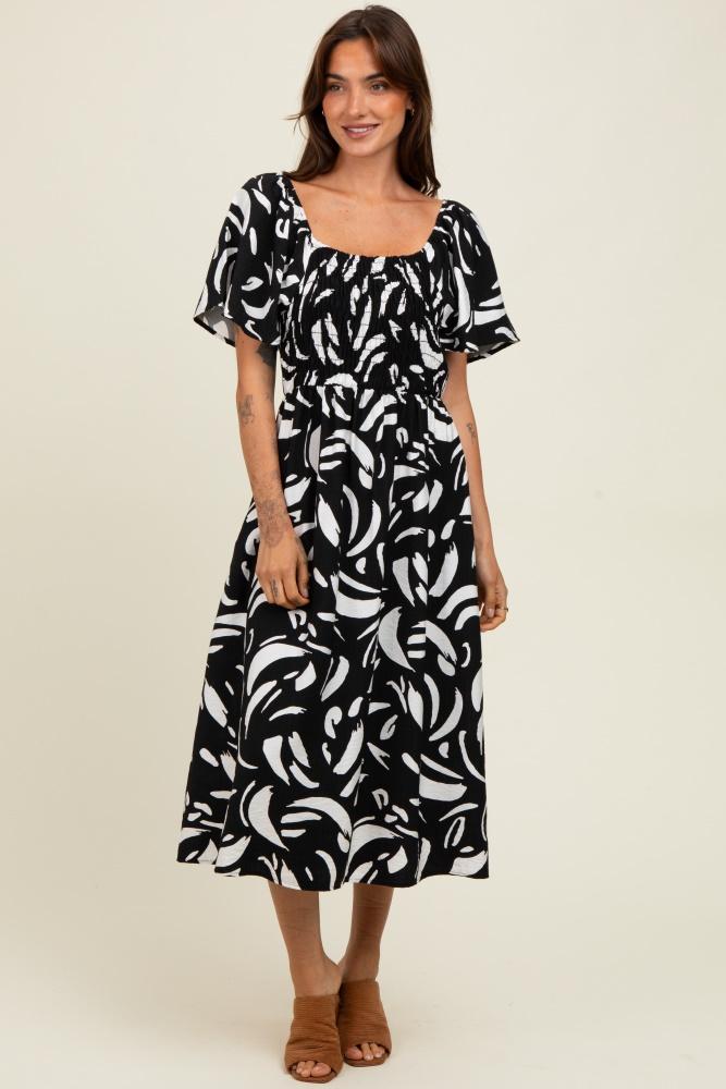 black printed smocked midi dress